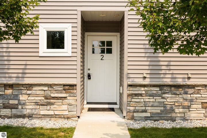 Property Photo:  1143 E Eighth Street 2  MI 49696 