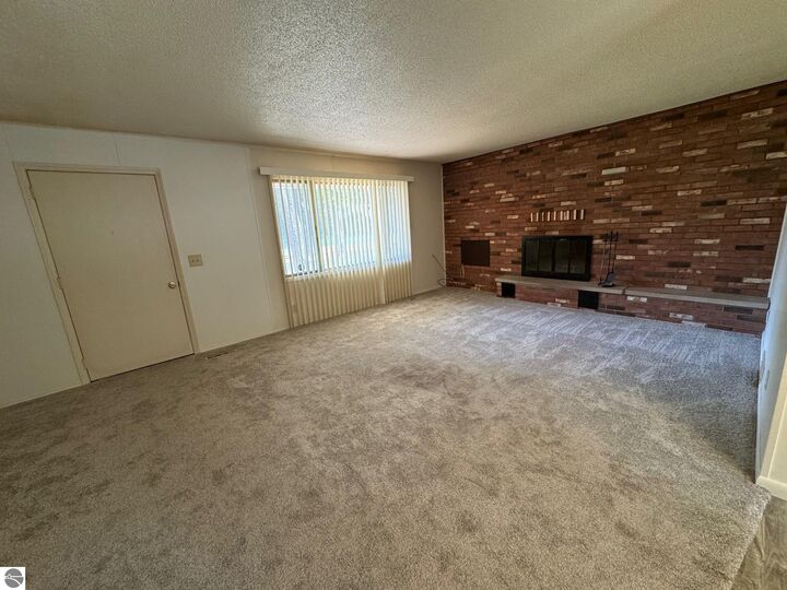 Property Photo: 6247 Artesia Beach Road MI 48656