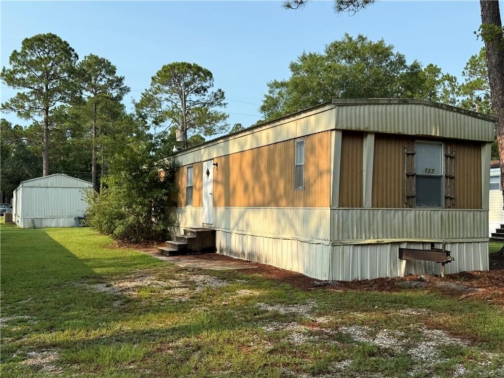 Property Photo: 64096 Mangano Road 117 LA 70452