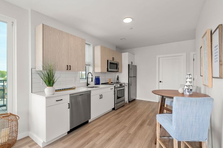 Property Photo:  10 Somerset 401  MA 02152 