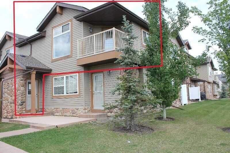Property Photo: 80 Panatella Landing NW 206 AB T3K 0K8