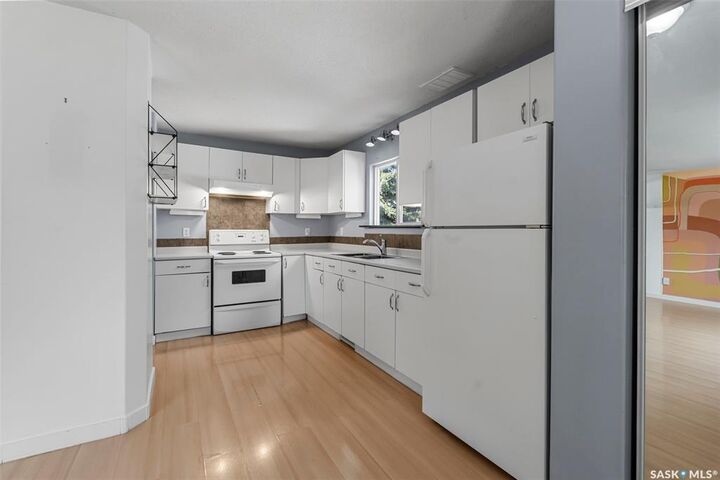 Property Photo:  603 K Avenue S  SK S7M 2E4 