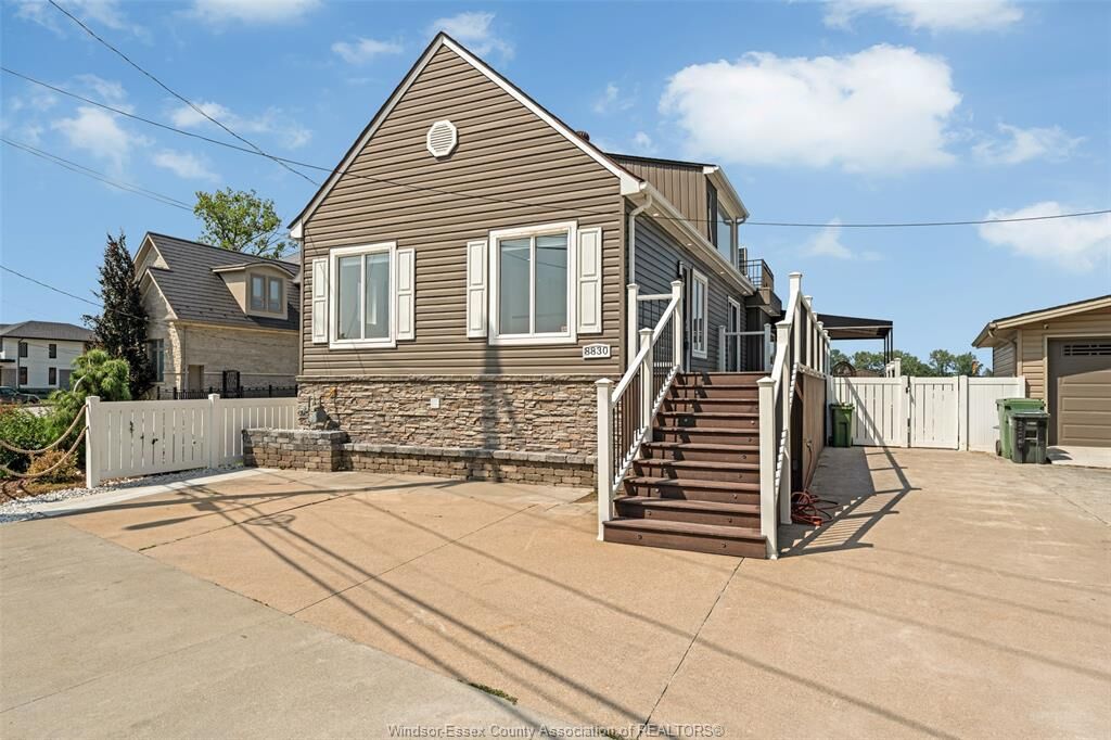 Property Photo: 8830 Riverside Drive East ON N8S 1G7