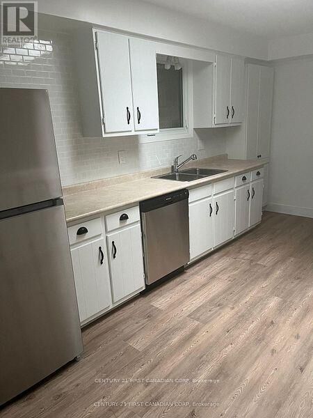 Property Photo: 62 Wexford Avenue Main ON N5V 1L9