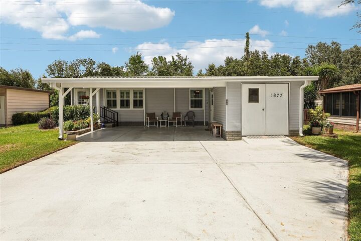 Property Photo:  1877 W Schwartz Boulevard  FL 32159 