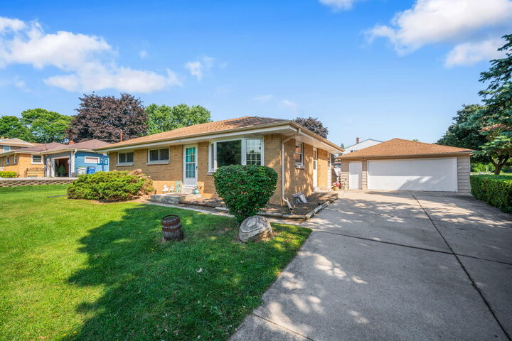 Property Photo:  11708 W Bobolink Ave  WI 53225 