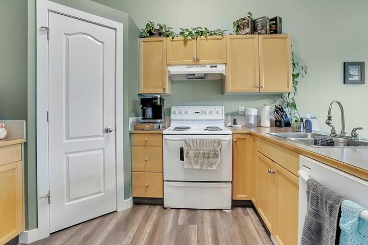 Property Photo: 219 Lancaster Drive AB T4R 2R4