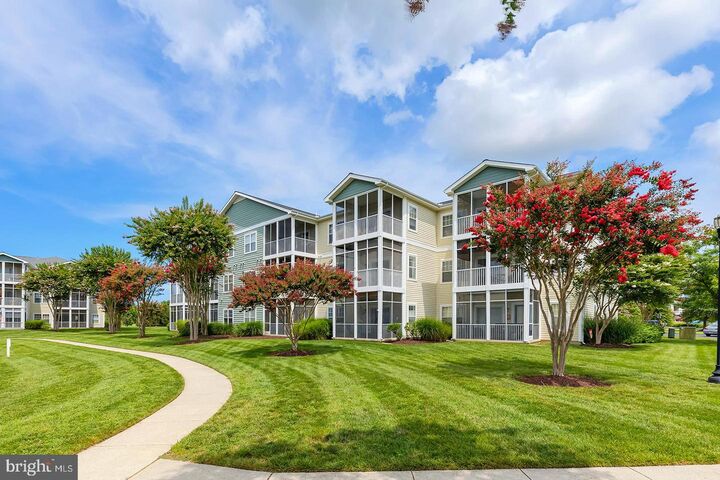 Property Photo:  33192 N Village Loop 5202  DE 19958 