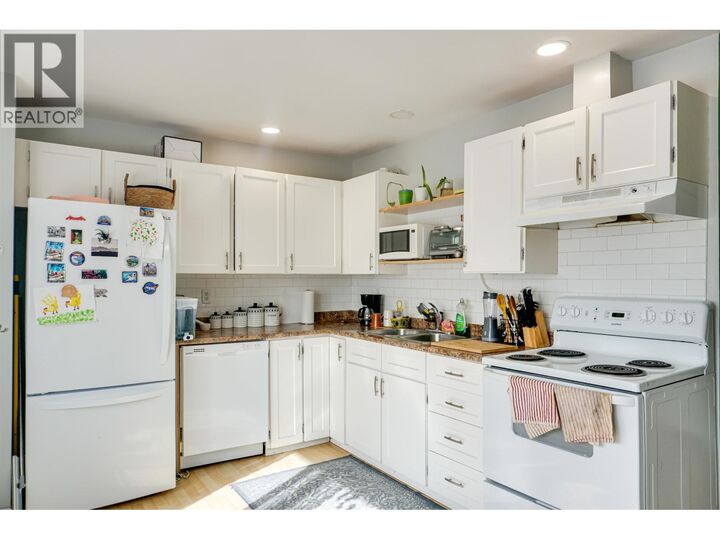 Property Photo:  1124 Tweedsmuir Avenue  BC V8C 1B7 