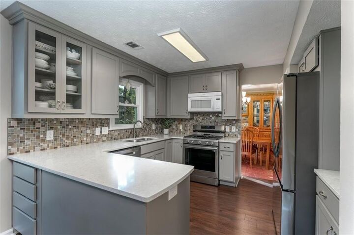 Property Photo:  1202 Shallowford Trace Court  GA 30189 