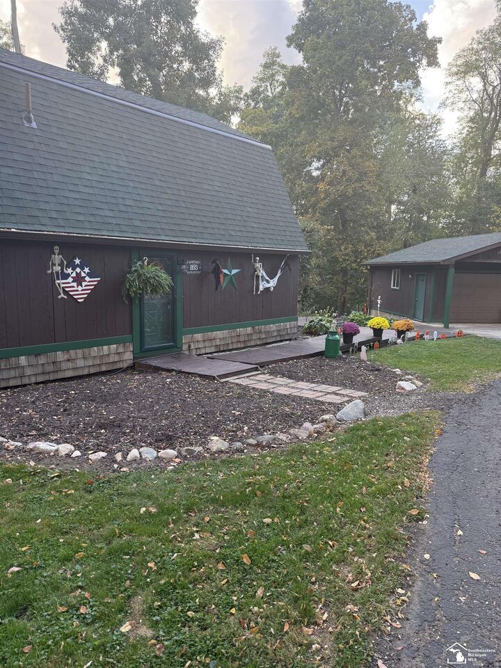 Property Photo:  1193 Sand Lake Highway  MI 49265 