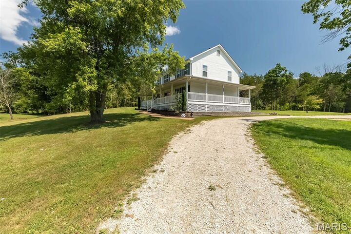 Property Photo:  8124 Ems Crossing Lane  MO 63050 
