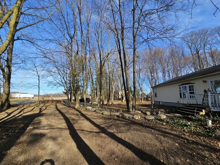 Property Photo:  7381 Lansing Avenue  MI 49201 