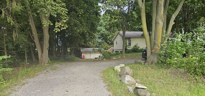 Property Photo:  7381 Lansing Avenue  MI 49201 