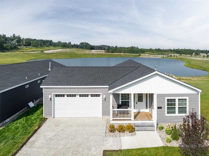 Property Photo:  1616 Pond Circle 65  MI 49770 