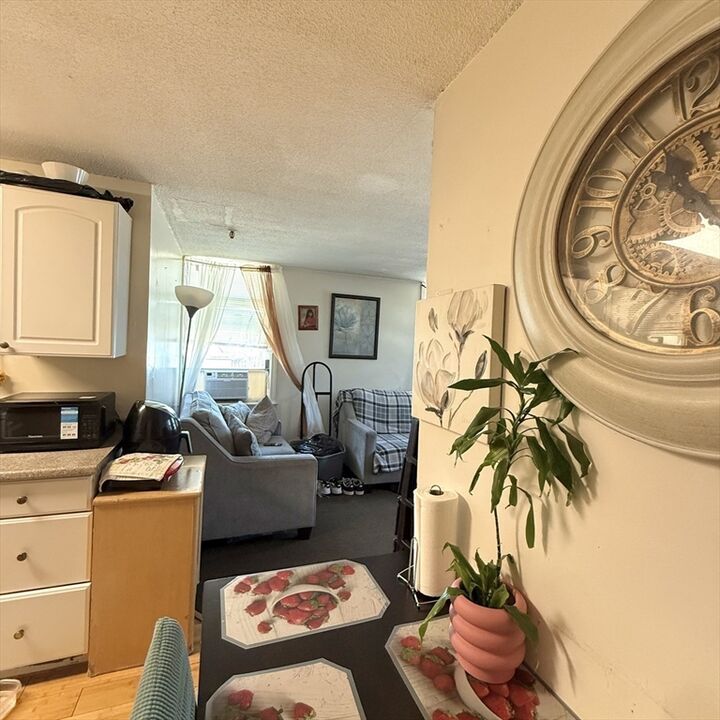 Property Photo:  46 Amesbury 4D  MA 01840 