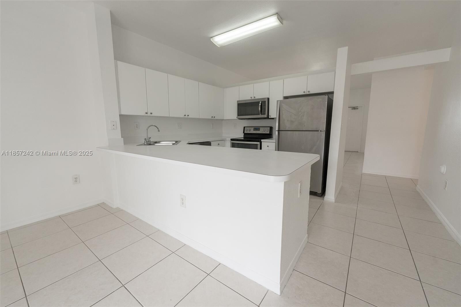 Property Photo:  6930 NW 179th St 407-8  FL 33015 