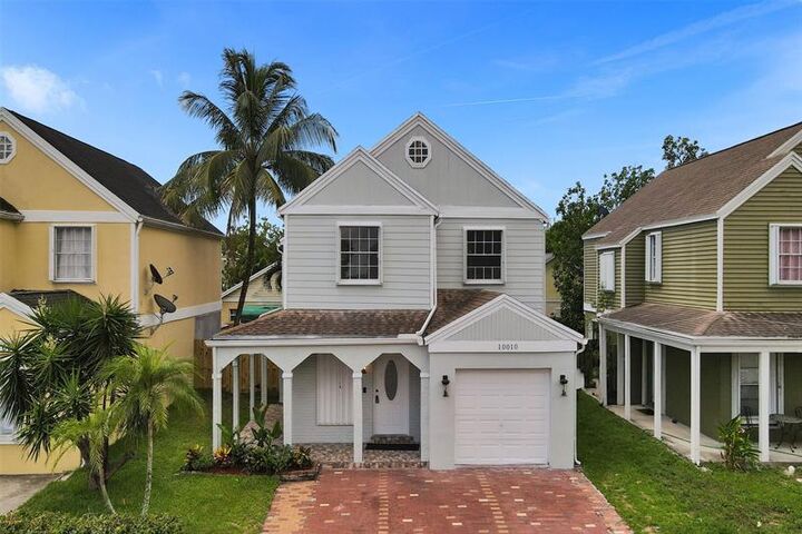 Property Photo:  10010 Loquat St  FL 33025 