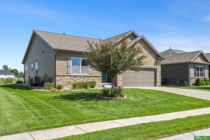 Property Photo:  2122 Skyhawk Avenue  NE 68133 
