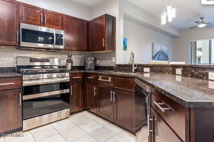 Property Photo:  945 E Playa Del Norte Drive 3003  AZ 85288 