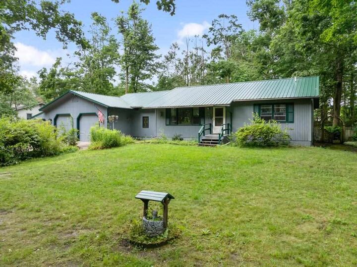 Property Photo: 1145 Woodland Dr MI 49770