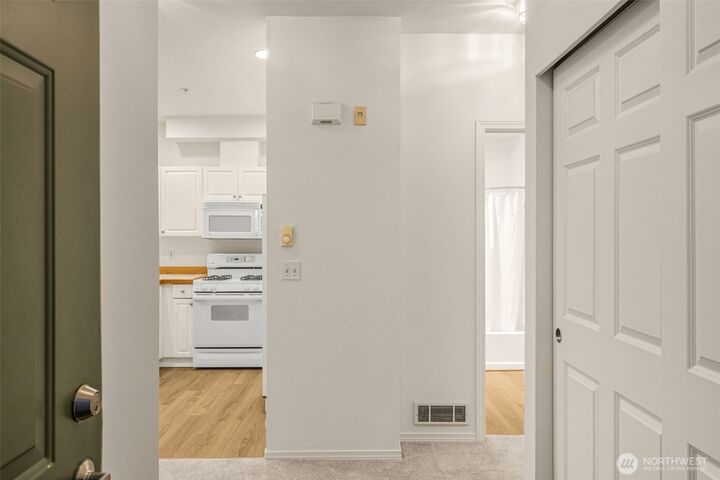 Property Photo:  12530  Admiralty Way I202  WA 98204 