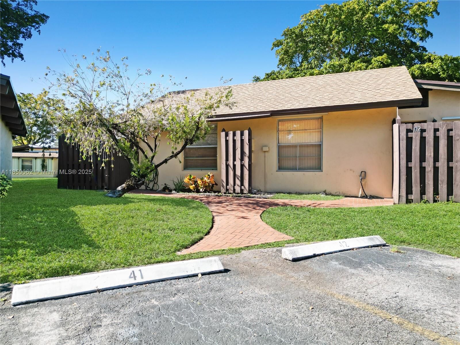 Property Photo: 114 Essex Rd 1-36 FL 33024