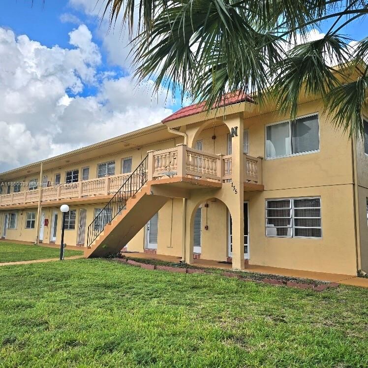 Property Photo:  135 NE 202nd Ter N18  FL 33179 