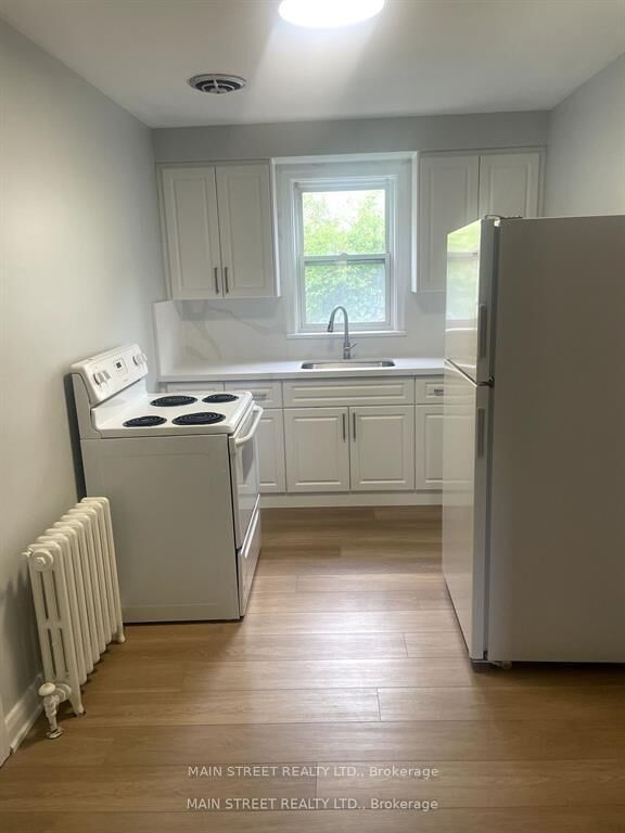 Property Photo: 36 Long Branch Avenue 5 ON M8W 3H9