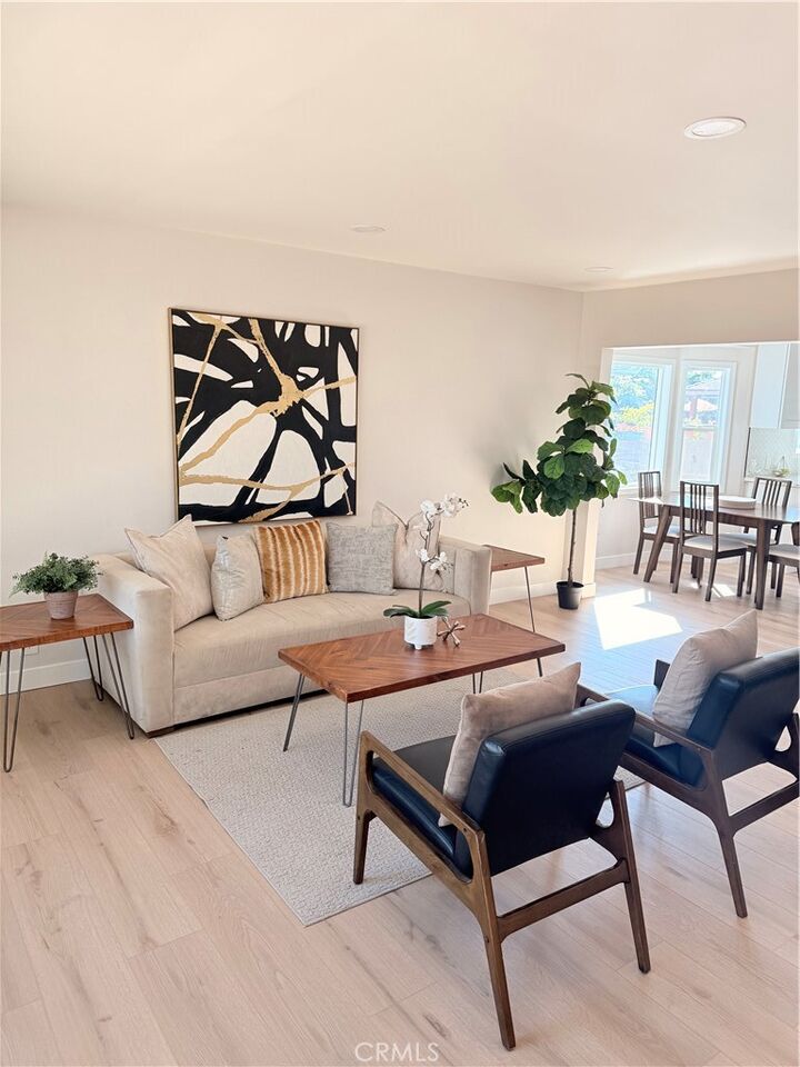 Property Photo:  9533 Paramount Boulevard  CA 90240 