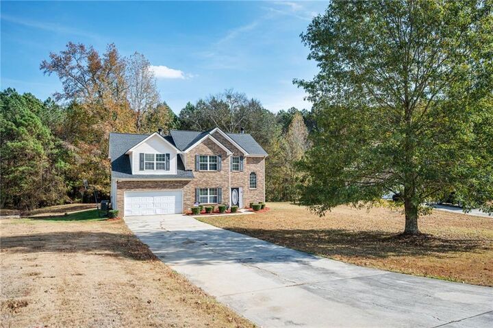 Property Photo:  7145 Magnolia Lane  GA 30213 