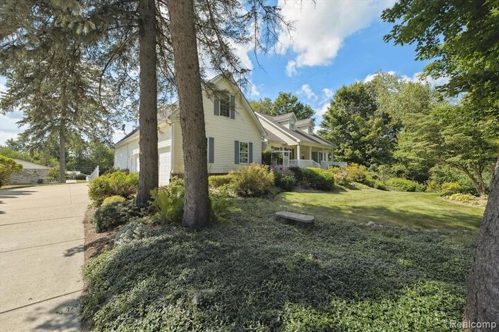 Property Photo:  7127 Perry Lake Road  MI 48346 1655 