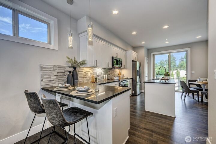 Property Photo:  5020  148th Street SW E1  WA 98026 