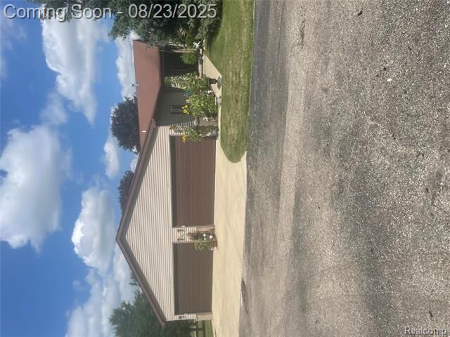 Property Photo:  5057 Sandalwood Drive  MI 48439 