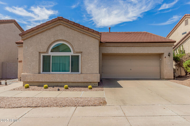 Property Photo: 1136 N 87th Place AZ 85207