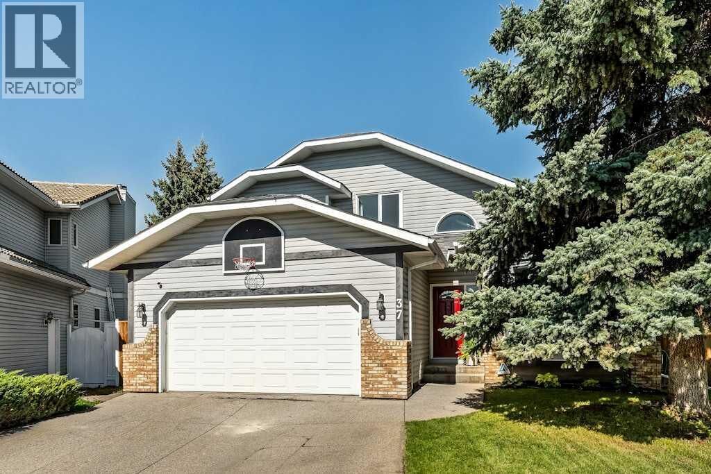 Property Photo: 37 Woodmark Place Southwest AB T2W 6A2