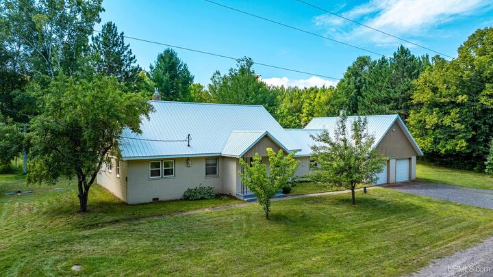 Property Photo: 24411 Upper Point Mills Road MI 49930