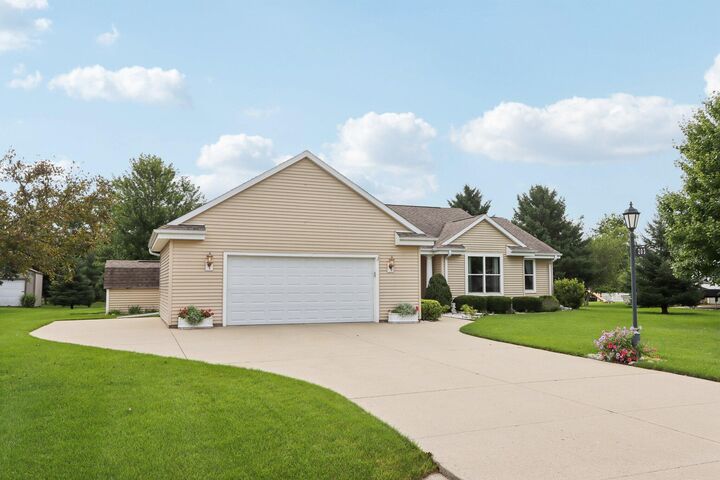 Property Photo: 203 Woodfield Dr WI 53119