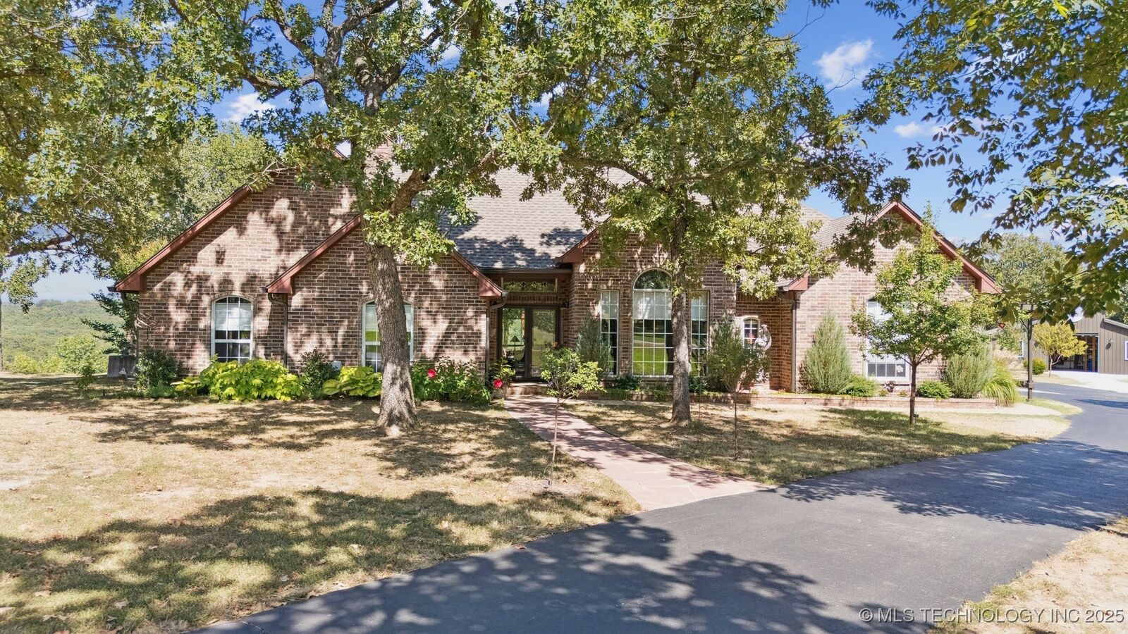 Property Photo: 5955 N 86th Avenue OK 74070