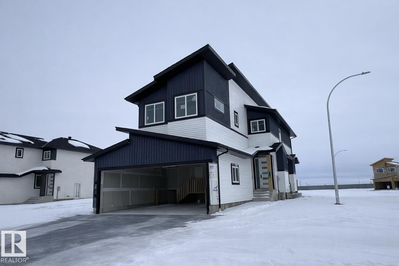 Property Photo:  77 Mockingbird Crescent  AB T8L 1P3 