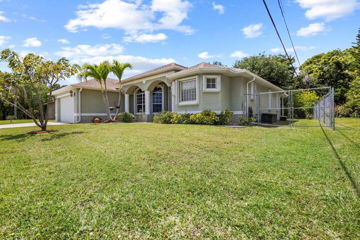 Property Photo: 2532 SE Leithgow Street FL 34952