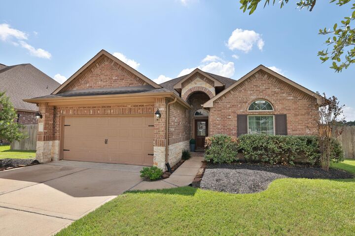 Property Photo: 11019 Arthurian Dream Court TX 77375