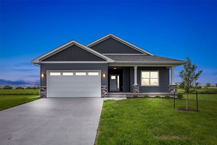 Property Photo: 1813 Sherman Drive IA 52240