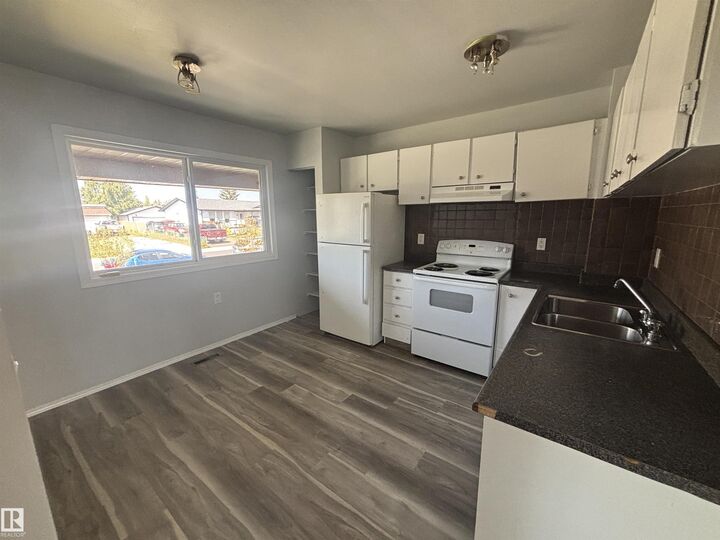 Property Photo: 13833 30 Street NW 1 AB T5Y 2B2