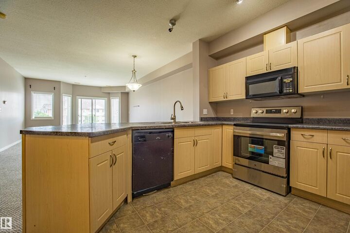 Property Photo: 4304 139 Avenue NW 326 AB T5Y 0H6