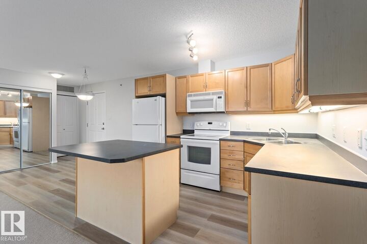Property Photo: 16311 95 Street NW 446 AB T5Z 3Y5