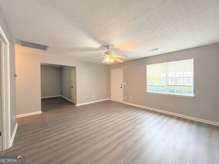 Property Photo:  209 E Wilson Street 34  GA 30180 