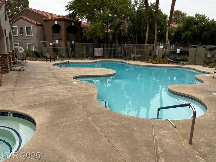 Property Photo: 7720 Secret Shore Drive 207 NV 89128