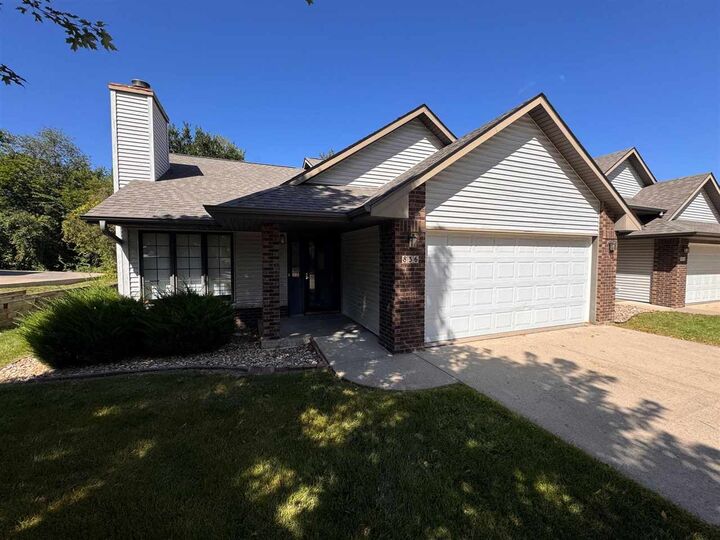Property Photo: 836 West Side Drive IA 52246