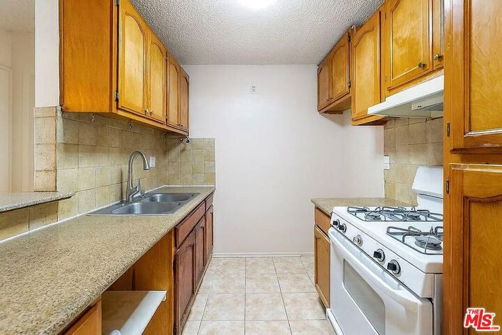 Property Photo: 18620 Hatteras Street 166 CA 91356